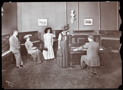 A piano showroom, New York, 1907 by Byron Company